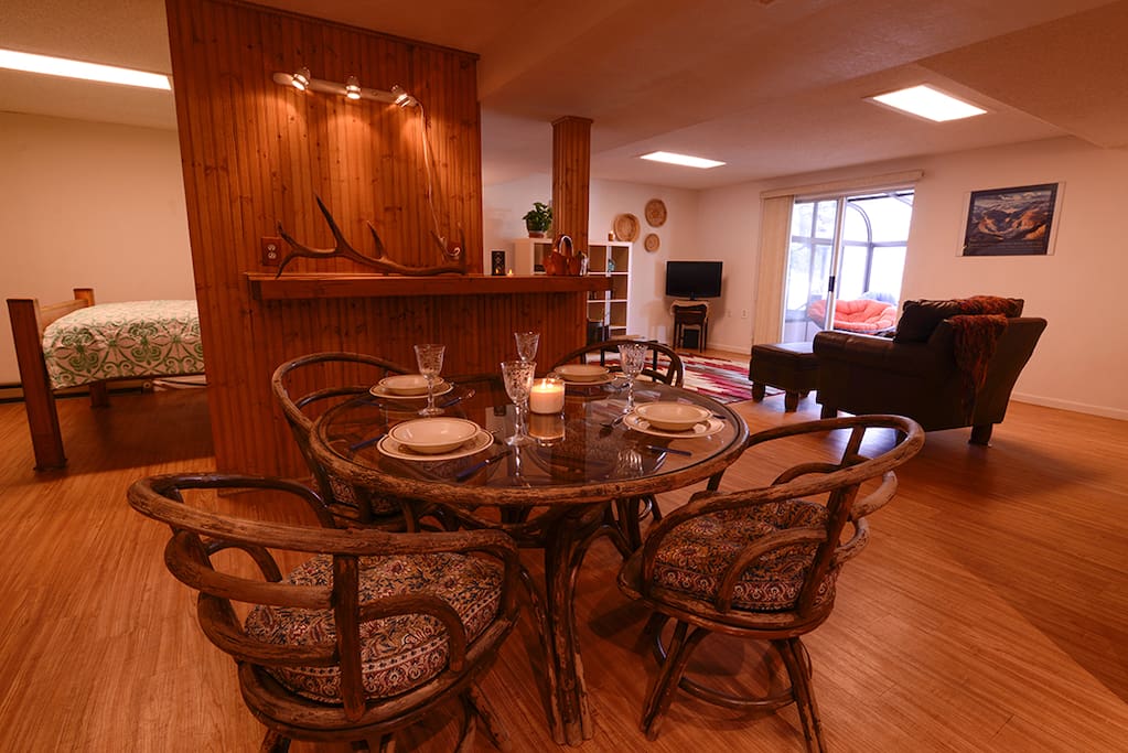 Rustic dining area with antique rattan table and chairs