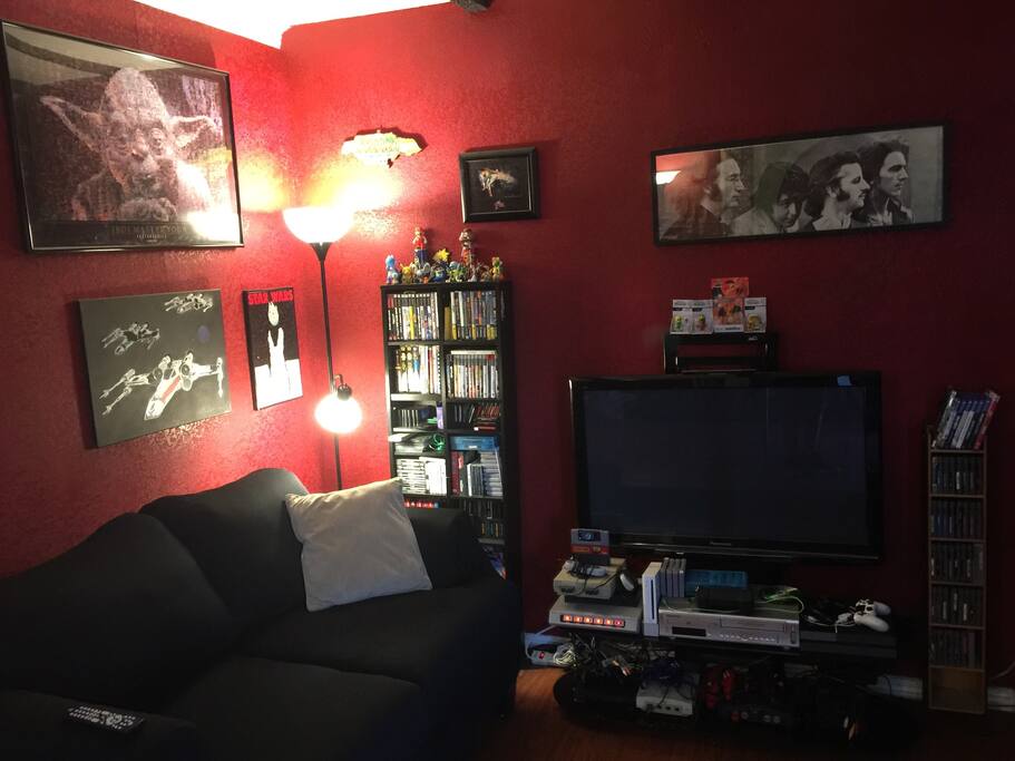 Our super awesome video game filled living room. We like Star Wars....