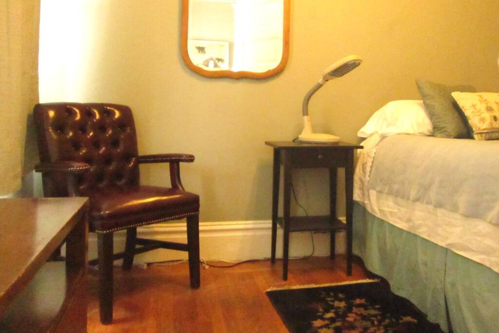 Same guest room with different lighting. Comfortable queen bed.
