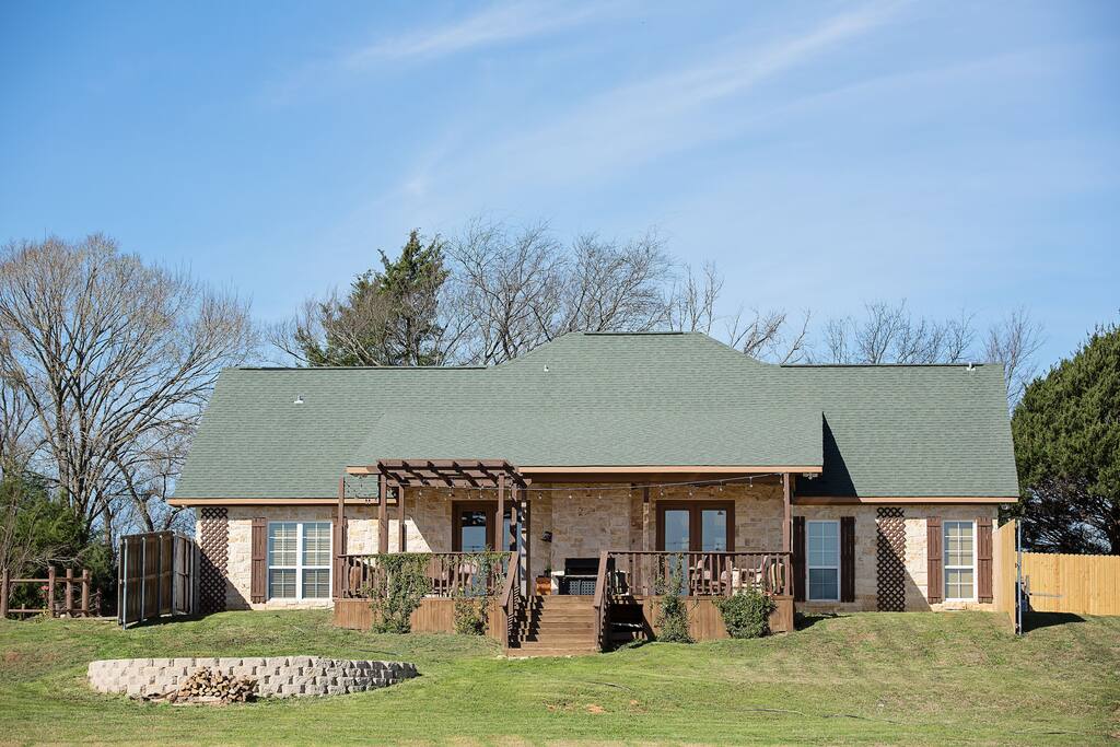 Back view of the B&B, with fire pit
