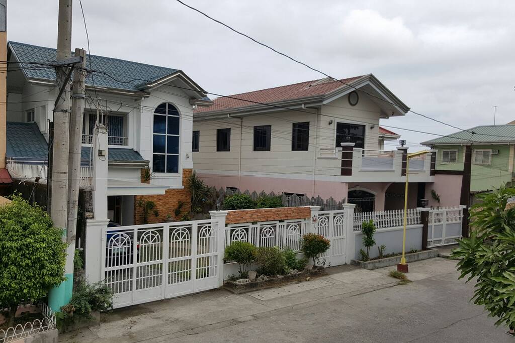 House and neighbors from street.