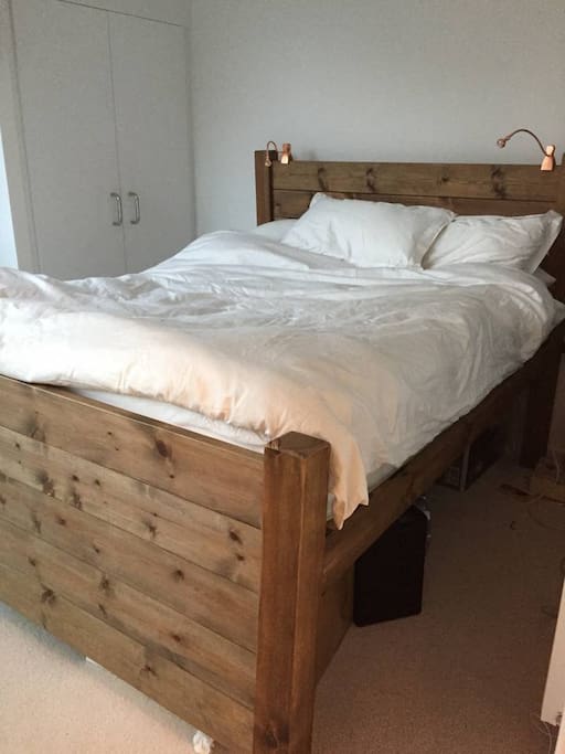 King Sized Bed with Duvet and Mirror Wardrobe