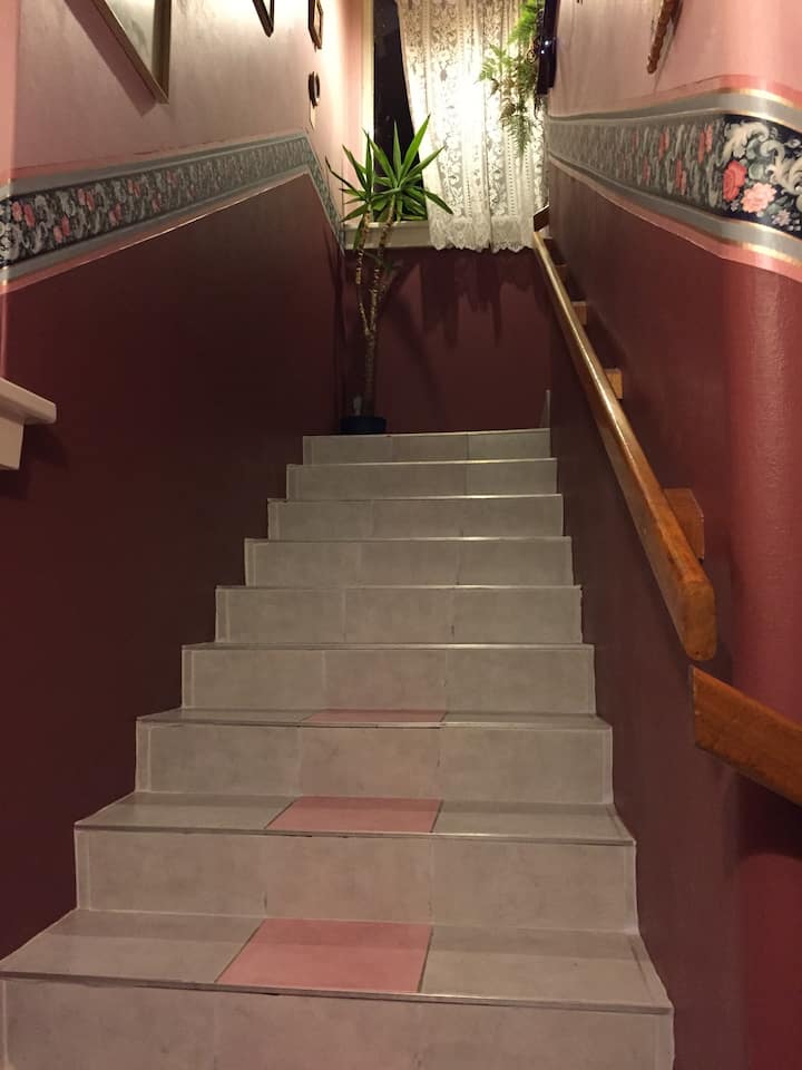 The stairs that lead up to your room.