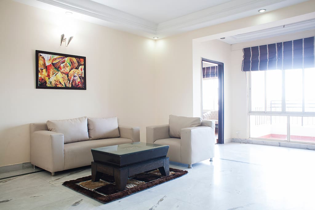 Living Room with 3 Seater Couch for comfortable stay of all guests