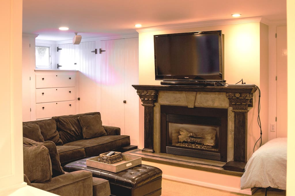 Beautiful gas fireplace and large TV with HDMI cable