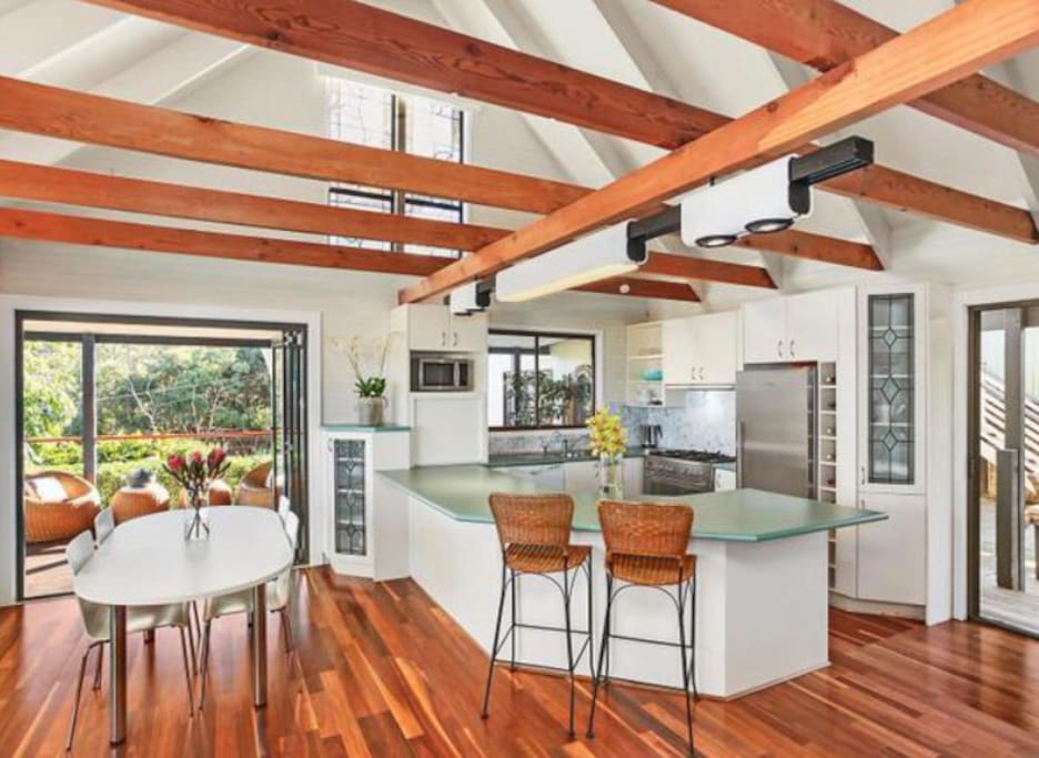 Open plan kitchen and dining, leading out to our gorgeous wrap around veranda