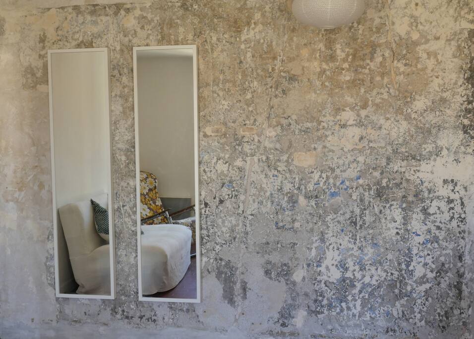 Stripped-back wall in living room (circa 1850)