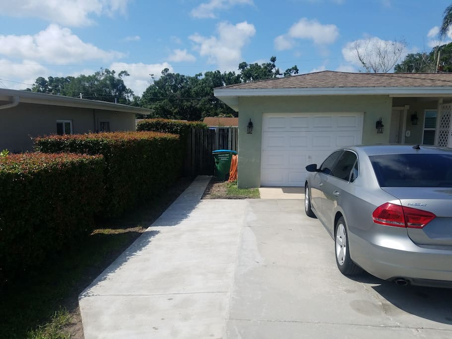 Private parking spot and walkway to private entry