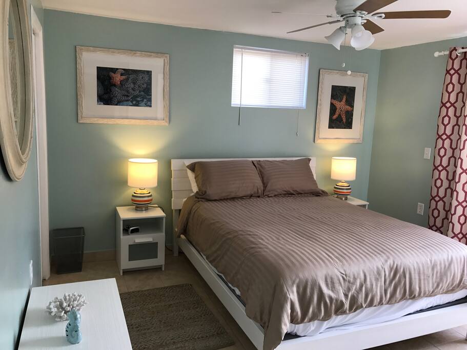 Bedroom - lots of closet space and access to a private fenced in outside patio