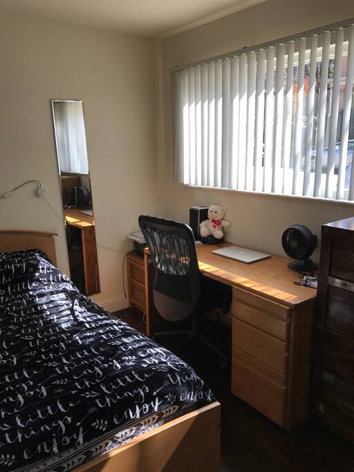 Big desk with a chair.