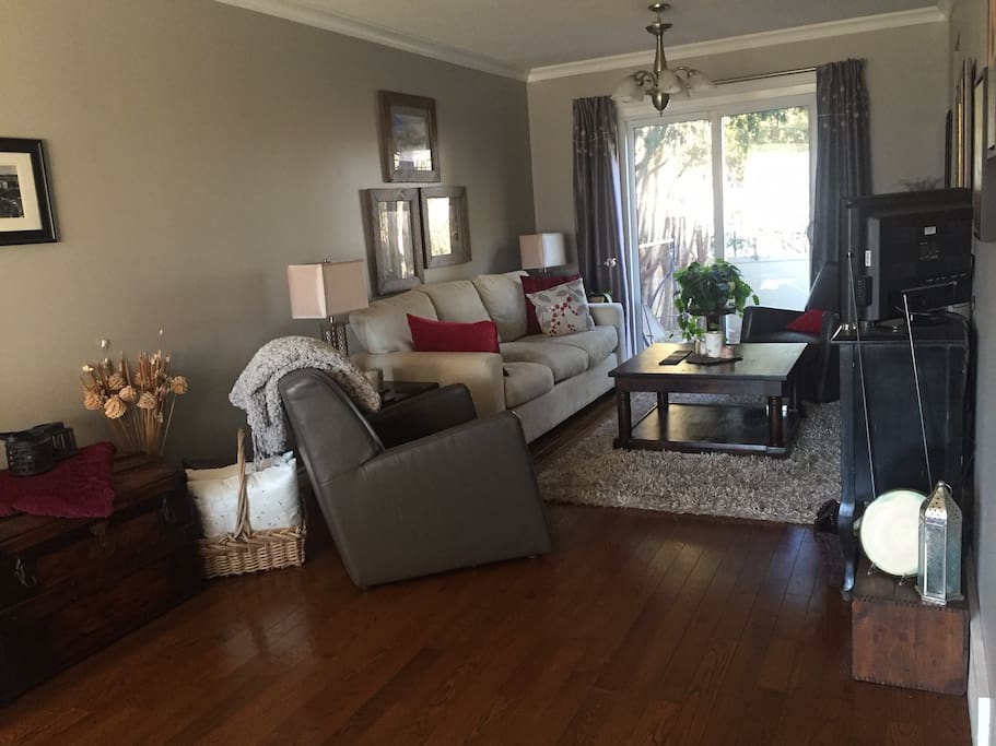 Living room with patio to private backyard