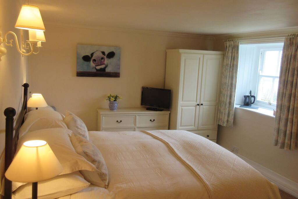 The cow lows guests to sleep.