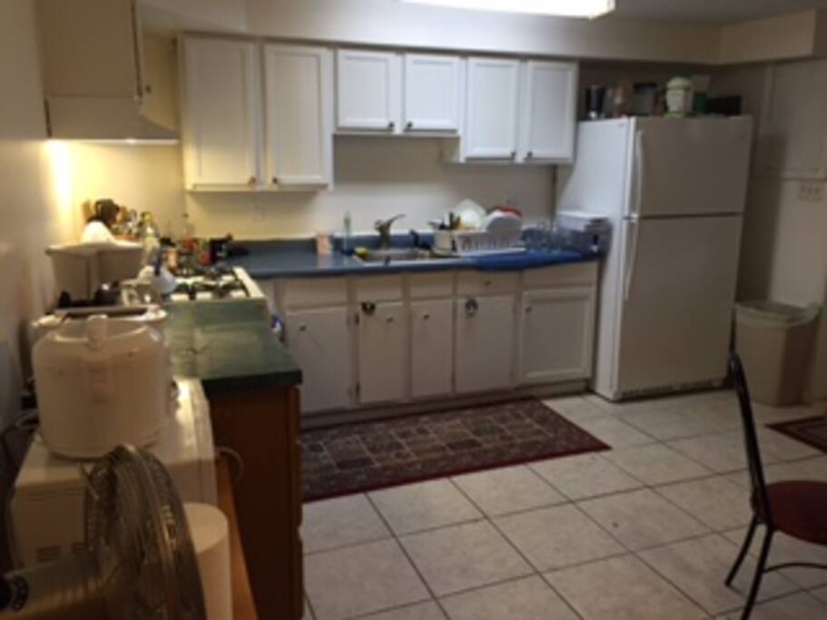 Kitchen area to include microwave, oven, fridge, rice cooker, coffee maker, French Press, toaster, and all of the amenities to make a meal at your convenience.