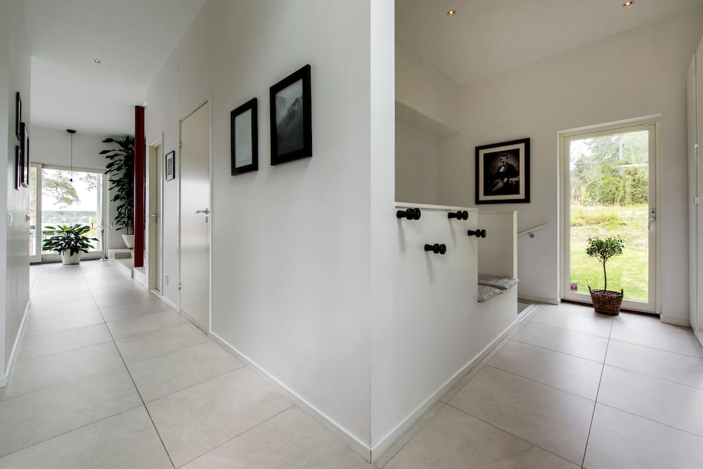 Main entrance hallway and stairs to the ground level floor