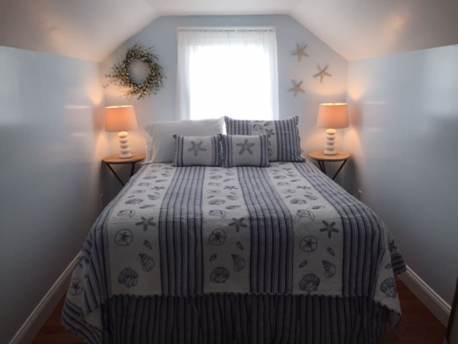 Beautiful bedroom with flat screen TV