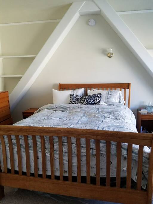 The bedroom is equipped with plenty of light, space and a comfortable queen sized bed