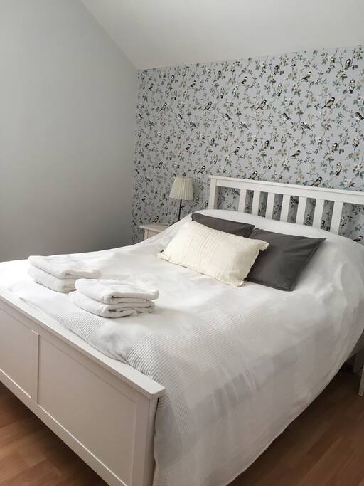Bedroom one with double bed, tea/coffee making facilities and a view over the garden.