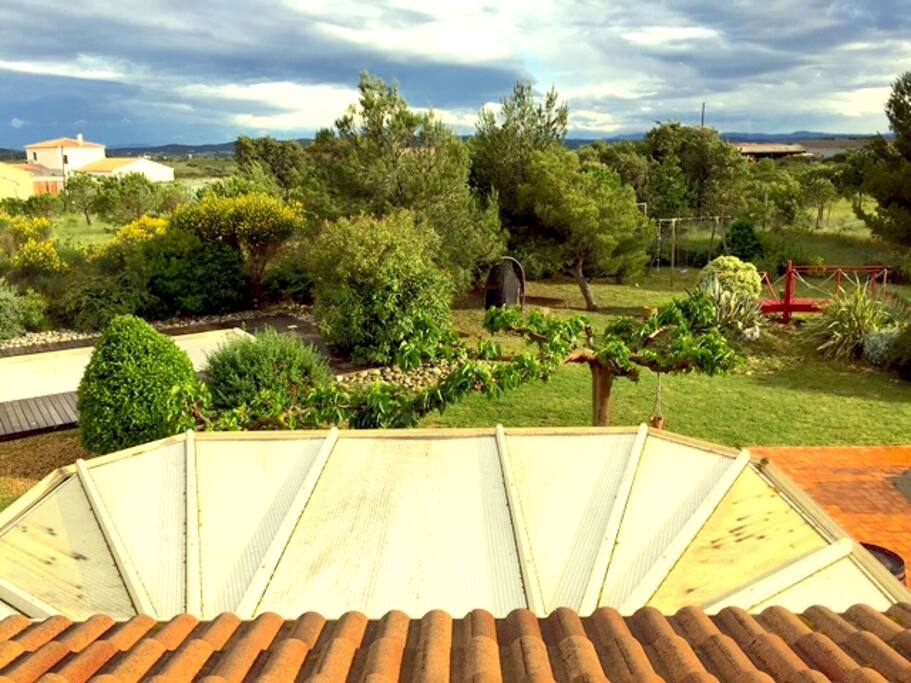 Vue sur jardin d'une des chambre à l'étage.