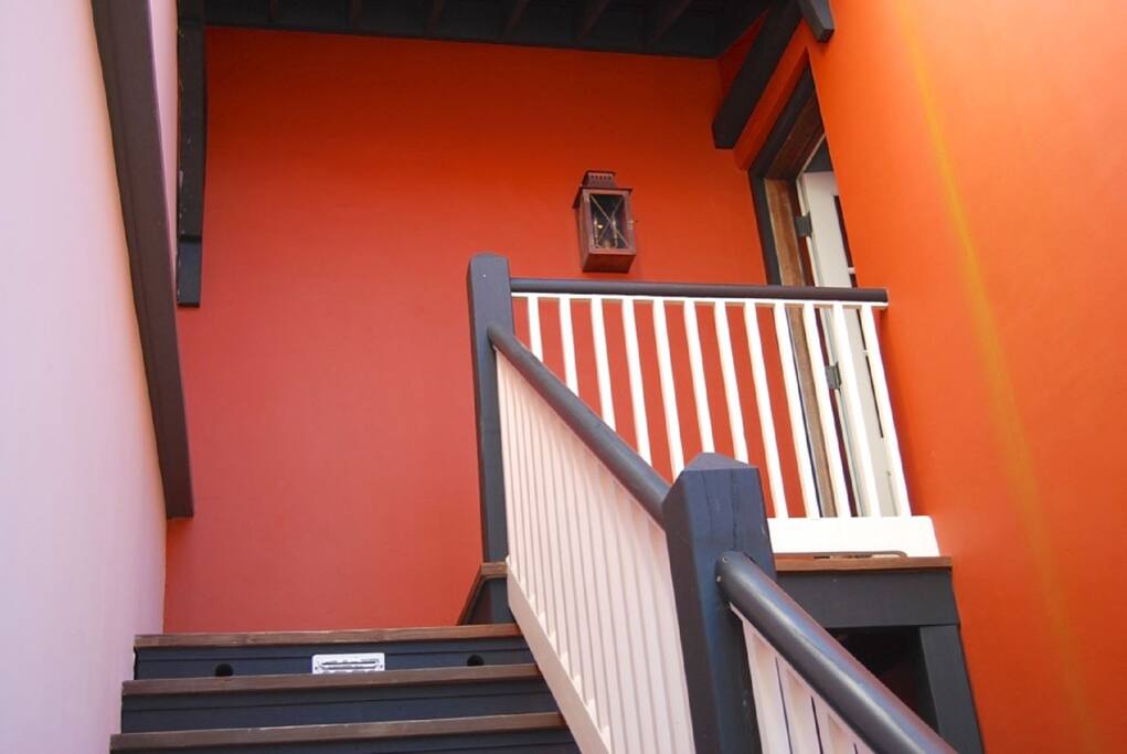 The entrance to the carriage house from the street.