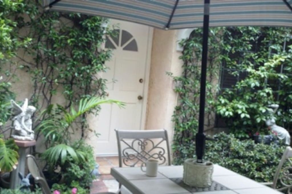 Lovely garden patio at entry