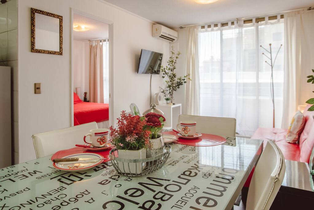 Living and dining room, you can see the air conditioner unit