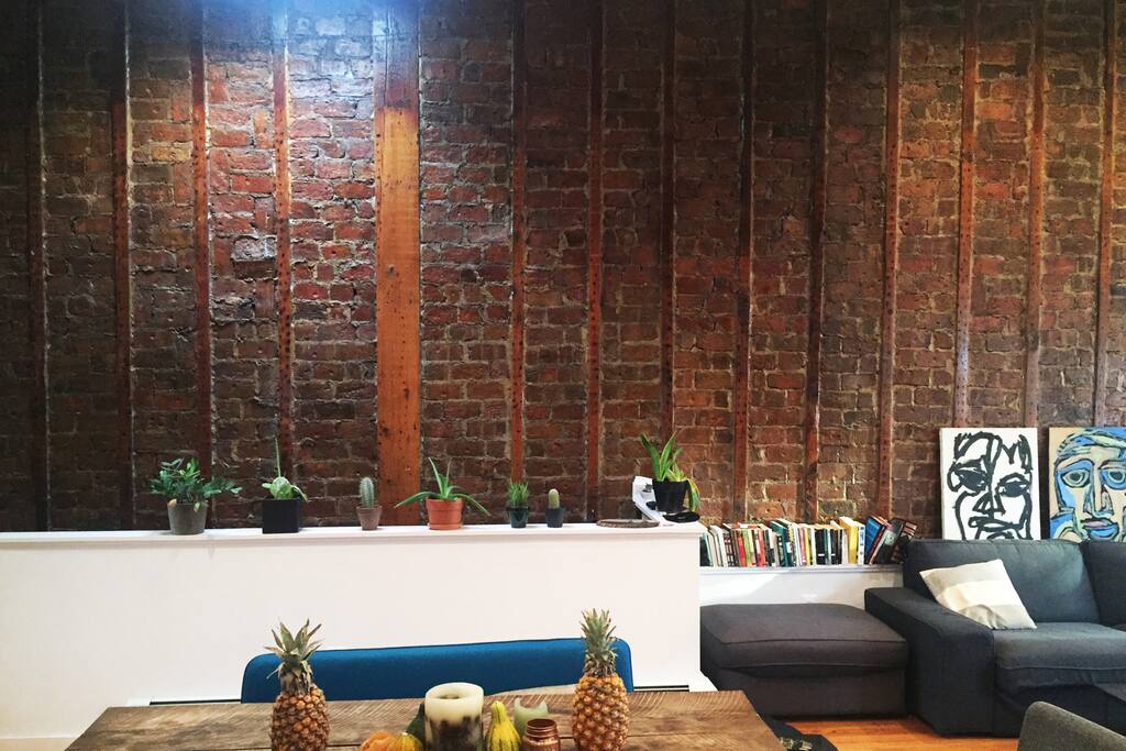 20' high ceilings, brick walls