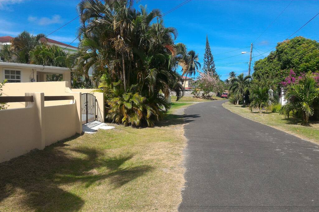 Apartment entrance on the left. Area is great for sunrise walks or to catch a wonderful Caribbean Sunset