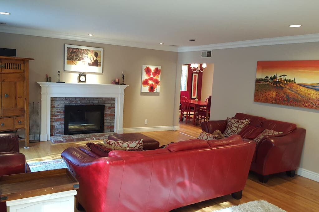 Comfortable living room with leather couches, fireplace (real wood or duraflames ok) and a TV. Roku and Netflix + plenty of kids DVDs. We also have an assortment of fun family board games and Cards Against Humanity for the grownups