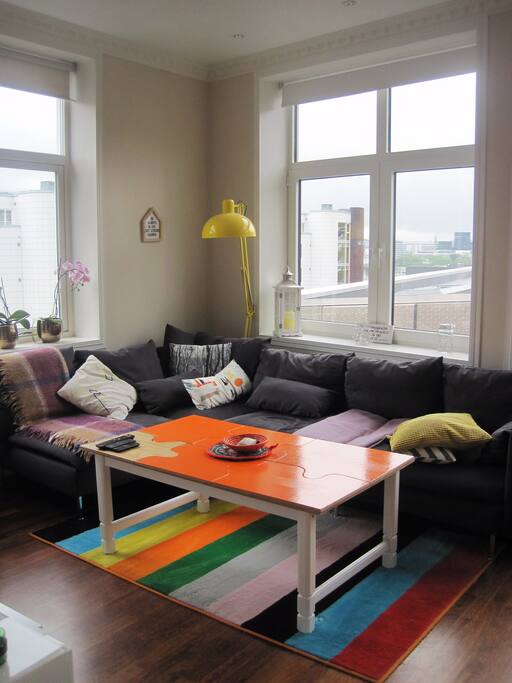Sofa, can easily fit one adult (or two kids)
