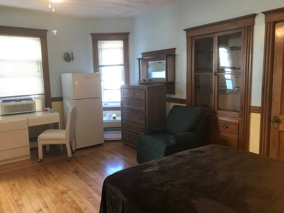 Bright window light and build in furniture.