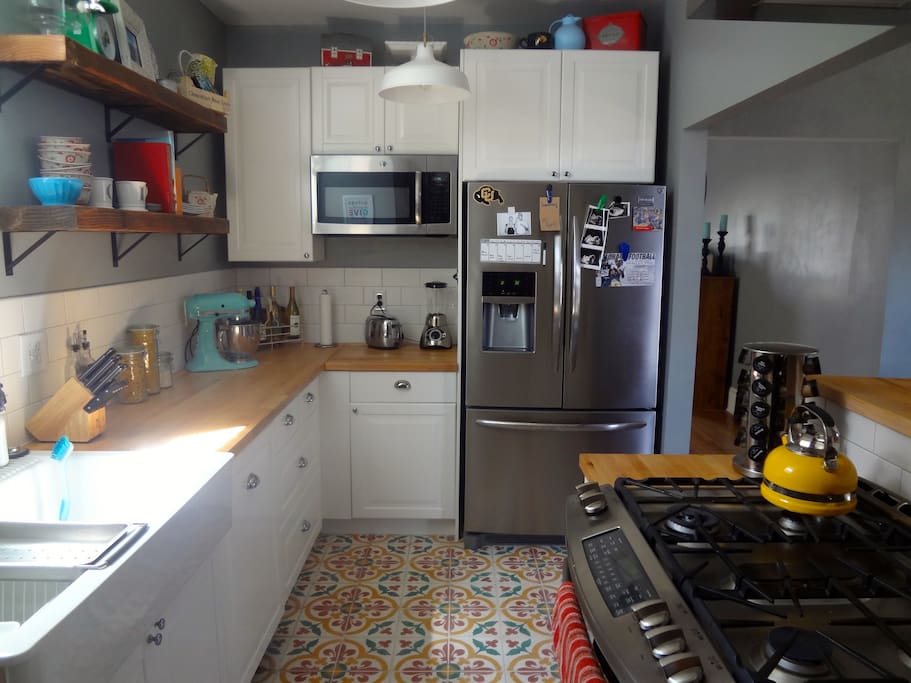 Kitchen with use of double oven and stove, french door fridge, microwave, and KitchenAid.