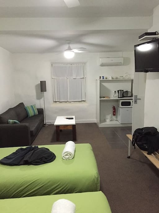 Large couch in spacious living area