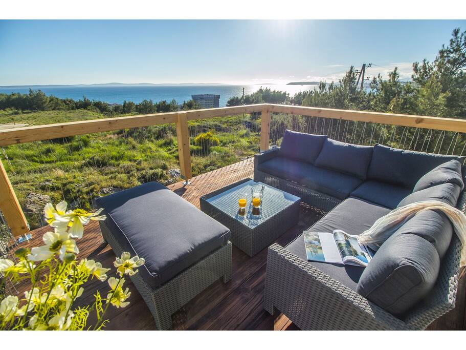 Outside terrace with view on the sea and islands/day time