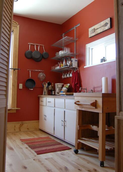 Newly painted kitchen with new pots/plans, plates and a big butcher block for chopping. Fully equipped to save you $$ by having some meals in!
