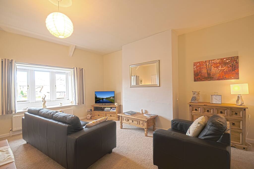 A bright and airy Living Room with beautiful views of Simsonside