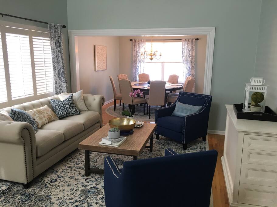Formal living room and formal dining with seating for 8.