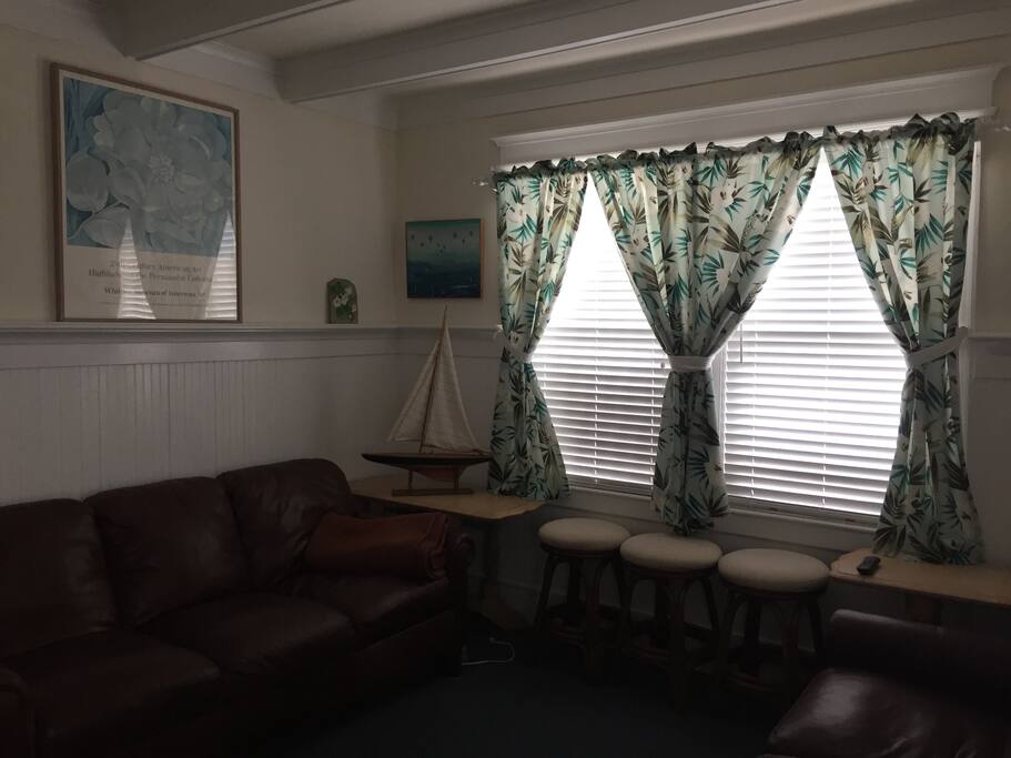 Living room with internet and 42 inch flat screen TV.