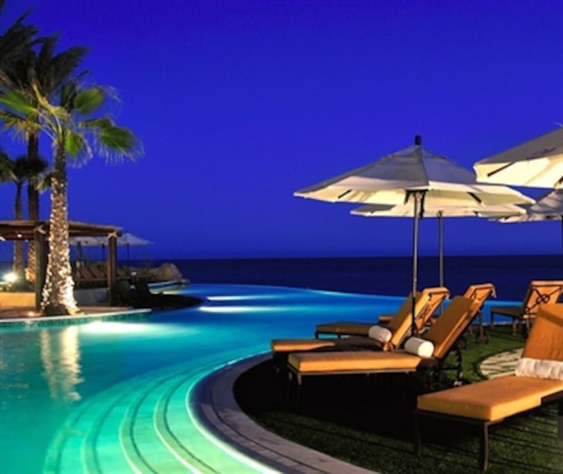 Lounge at our spectacular infinity pools