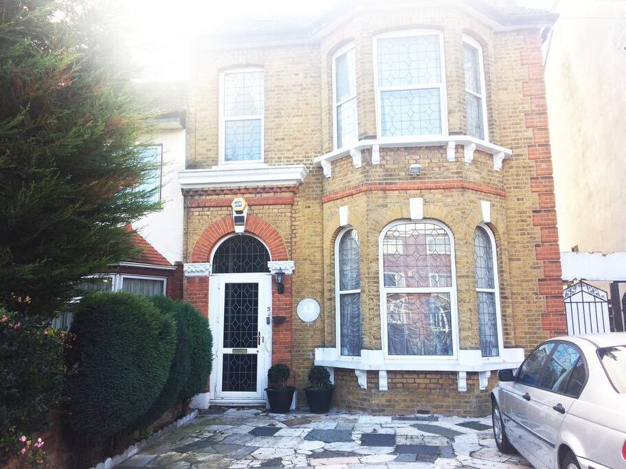 Front of the house with one free car parking space.