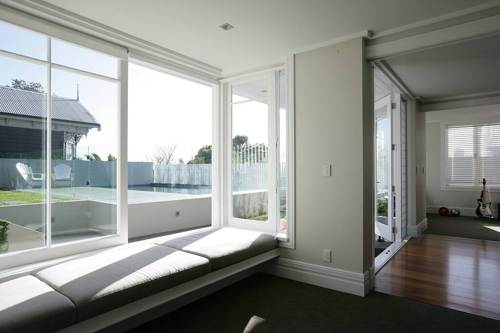 Bedroom 1 .Spacious sunny bedroom with double bed,window seat and desk.Opens onto hall way between the 2 bedrooms