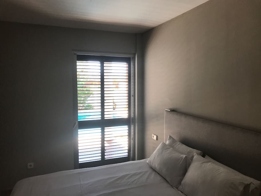 Master room and access to pool and deck area outside.