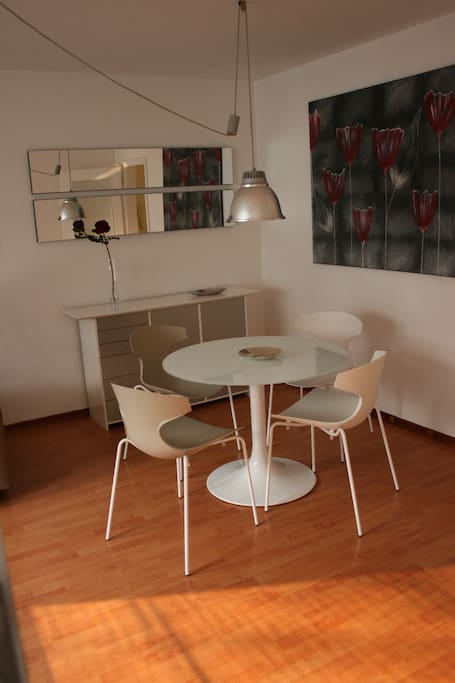 Modern round glass table with 4 chairs - only Italian design furniture