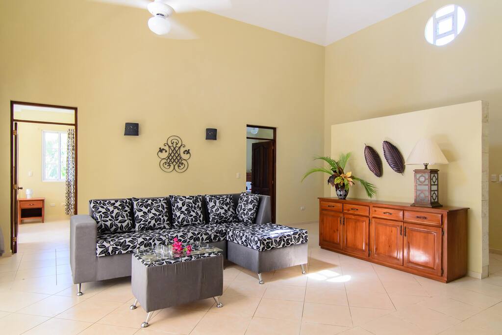living area with entrance to one bedroom