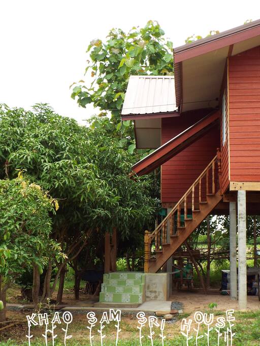 We access the room floor through a wood staircase.