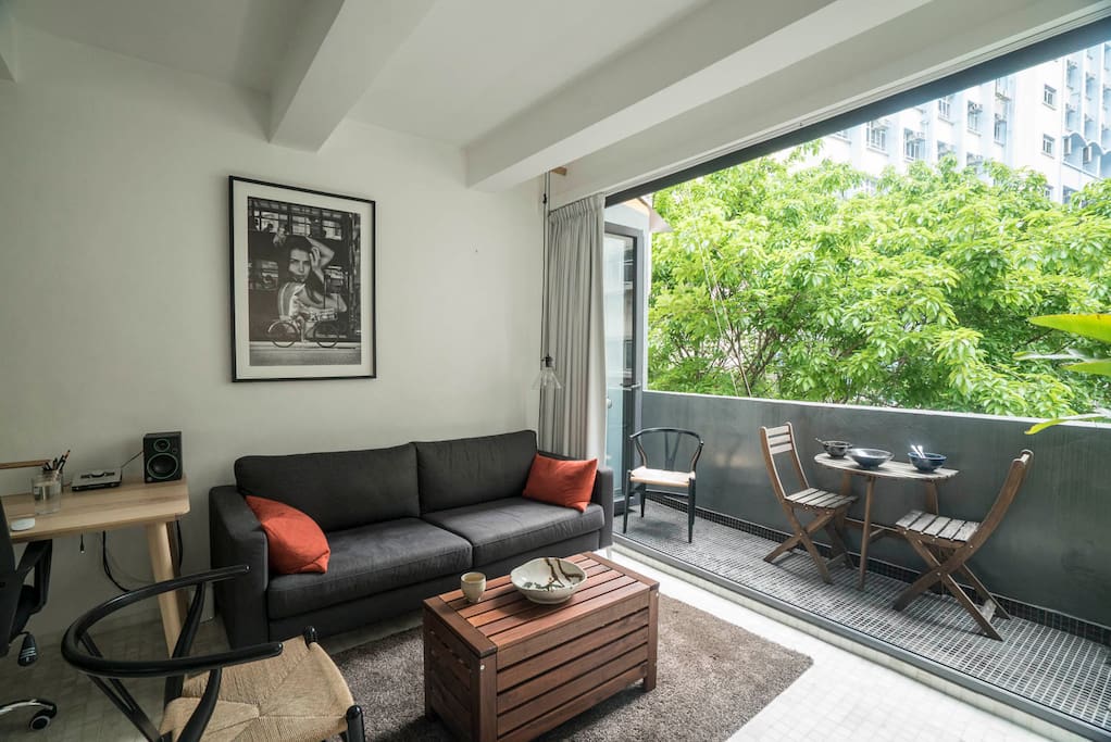 Sofa and folding doors to balcony