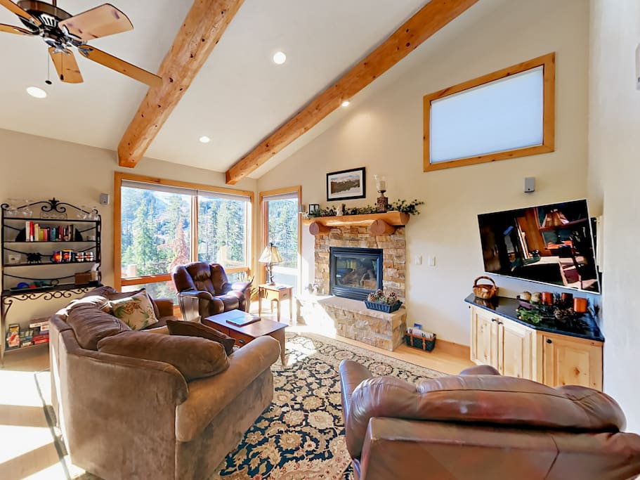Cozy up in front of the gas fireplace with seating for 6 in the living room.