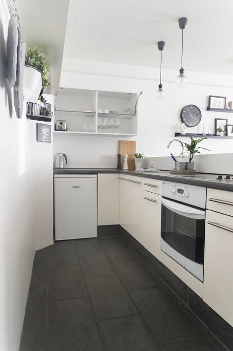 Well equipped open kitchen.