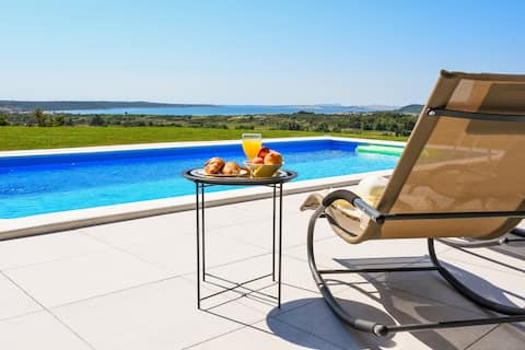 Popular Airbnb listing: Villa Matak-heated pool with spectacular sea view in Poljica Brig