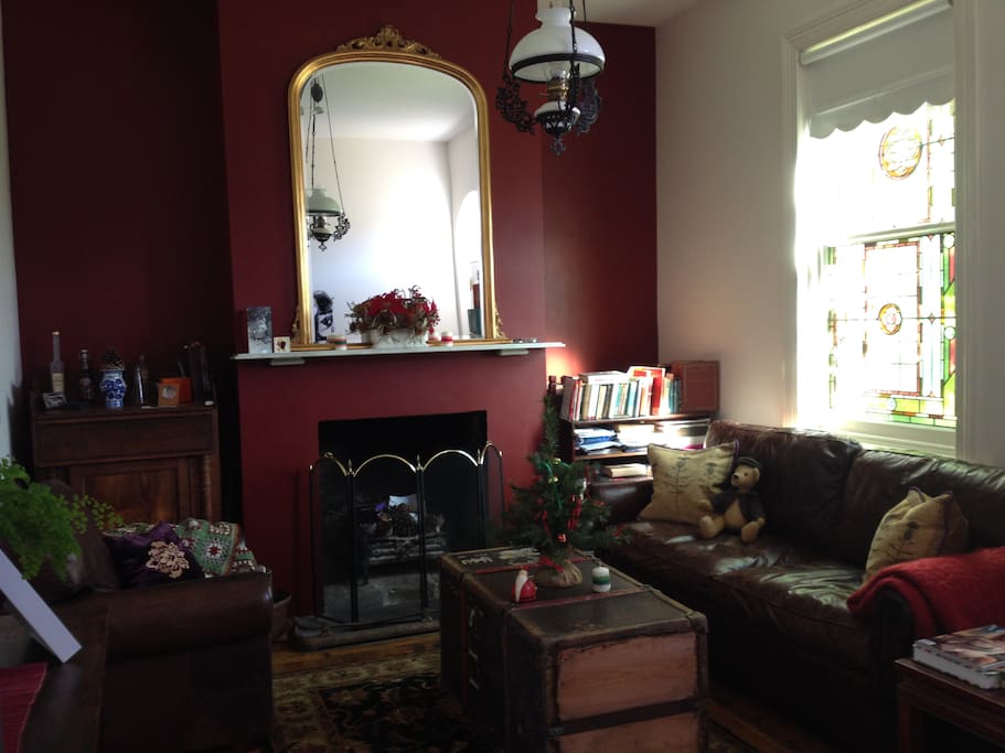 Lovely living room with open fire place