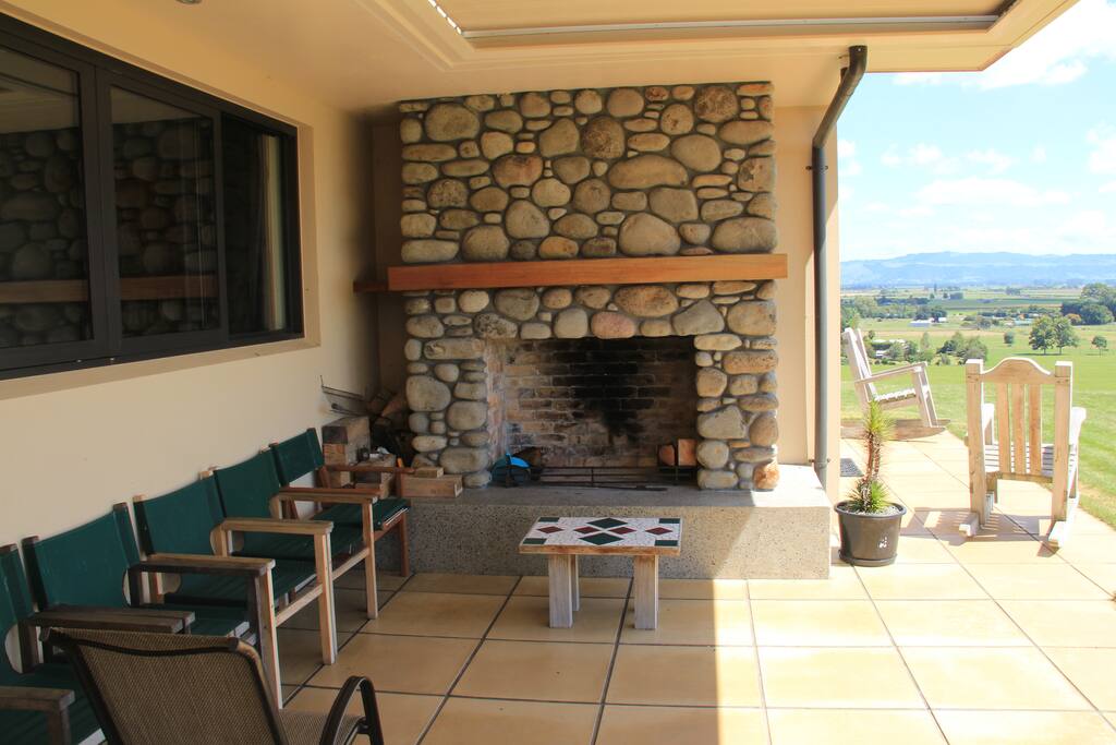 Outdoor fire next to guest apartment